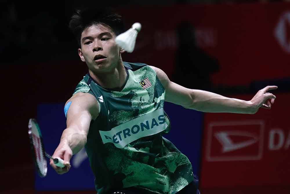 Jun Hao mara ke pusingan kedua Terbuka Singapura selepas menewaskan pemain Jepun pada Selasa. Foto Agensi