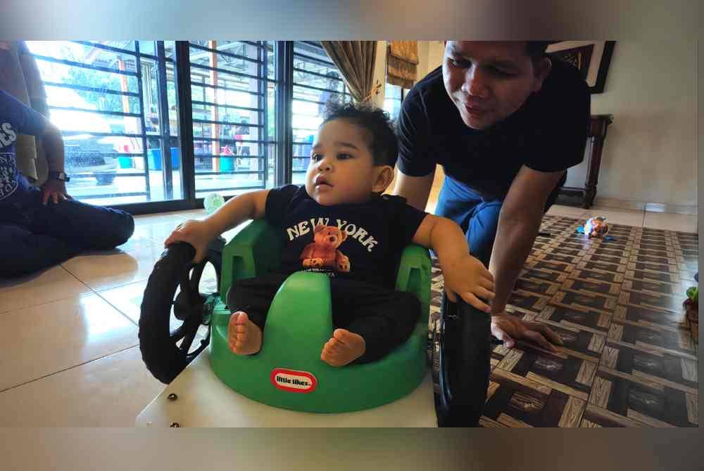 Mohd Noor Syazwan tak sangka ciptaan kerusi roda untuk Qhalish dapat perhatian ramai.