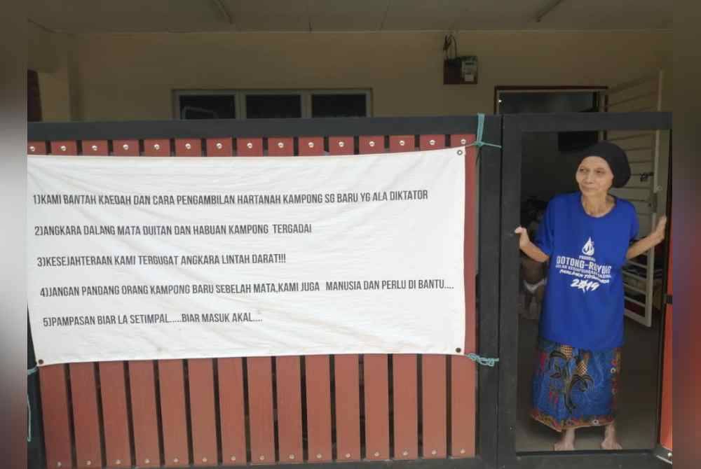 Antara kain pemidang yang dipasang penduduk.