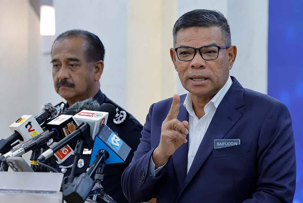 Saifuddin ketika bercakap pada sidang akhbar khas di Kementerian Dalam Negeri hari ini. - Foto: Bernama