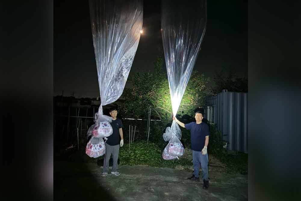 Pada awal Jun, Korea Utara berkata ia telah menghantar 3,500 belon udara yang membawa 15 tan sampah ke Korea Selatan. Foto EPA