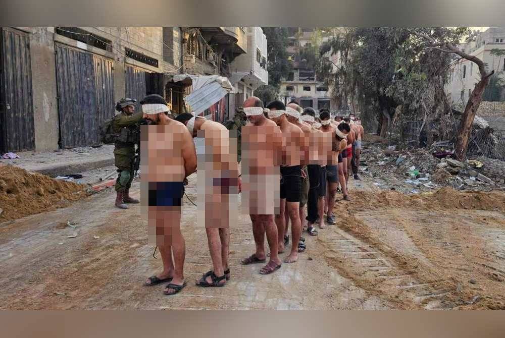 Israel sengaja membiarkan tahanan Palestin tidak berbaju selain tangan diikat dan mata mereka ditutup.