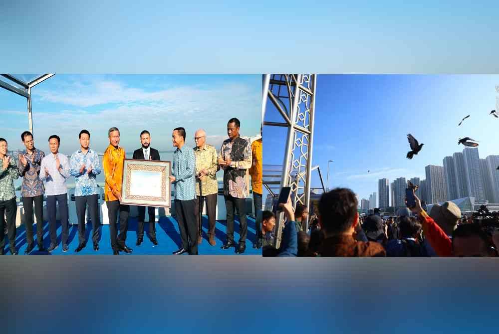 Onn Hafiz (dua dari kanan) bertukar cederamata dengan Vivian disaksikan Tunku Mahkota Johor sempena sambutan 100 tahun Tambak Johor, pada pagi Jumaat. 100 ekor burung dilepaskan tanda sambutan 100 tahun Tambak Johor yang menghubungkan Johor dan Singapura. Foto FB HRH Crown Prince of Johor