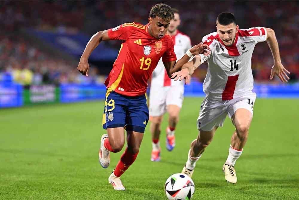 Yamal (kiri) ketika ini berada di Jerman mewakili Sepanyol dalam saingan Euro 2024. Foto AFP