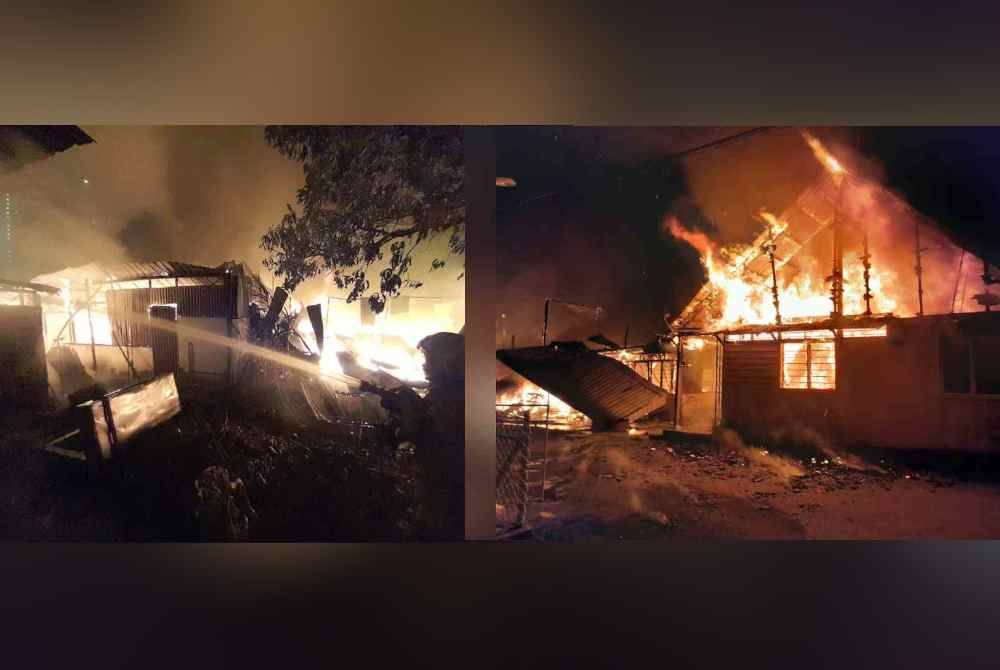 Anggota bomba sedang berusaha memadamkan api dalam kejadian melibatkan empat buah rumah di Jelutong Timur.