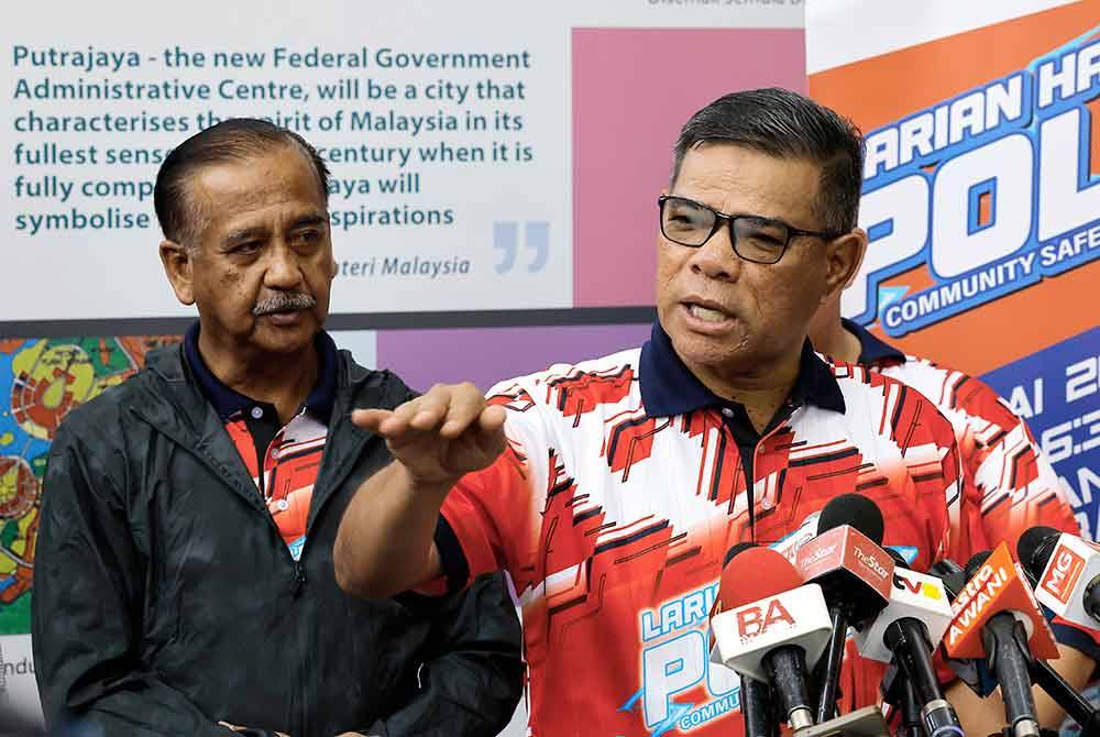 Saifuddin bercakap pada sidang media selepas Larian Hari Polis 'Community Safety Run' sempena Peringatan Hari Polis ke-217 di Dataran Putrajaya pada Sabtu. Foto Bernama