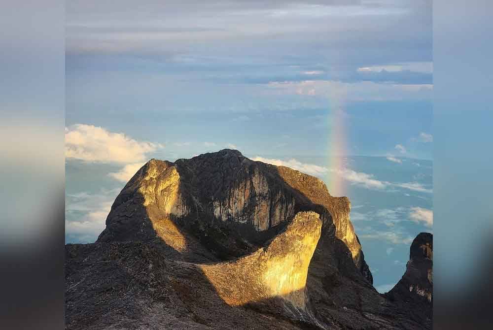 Sherry antara individu yang berpeluang menyaksikan keindahan pelangi di puncak Kinabalu pada Ahad.