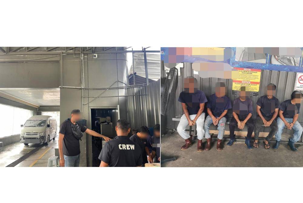 Antara warga asing yang ditahan untuk diperiksa dalam operasi di sebuah kedai mencuci kenderaan dekat stesen minyak berhampiran sebuah lebuh raya di Petaling Jaya pada Selasa.