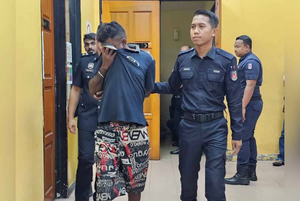 Nervin Rao (kiri) dihukum penjara empat tahun dan satu sebatan oleh Mahkamah Sesyen Teluk Intan pada Isnin selepas mengaku bersalah merompak sebuah kedai serbaneka, minggu lalu.