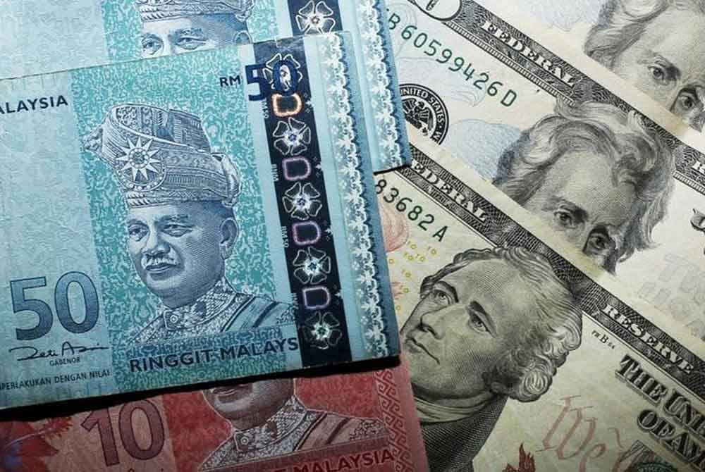 Ringgit ditutup sedikit rendah berbanding dolar AS pada Khamis berikutan pengambilan untung sederhana selepas mata wang tempatan mencecah paras tertinggi baharu dalam tempoh enam bulan semasa awal dagangan pada Khamis. Foto hiasan