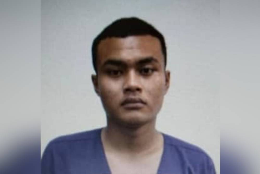 Foto lelaki yang diburu polis.