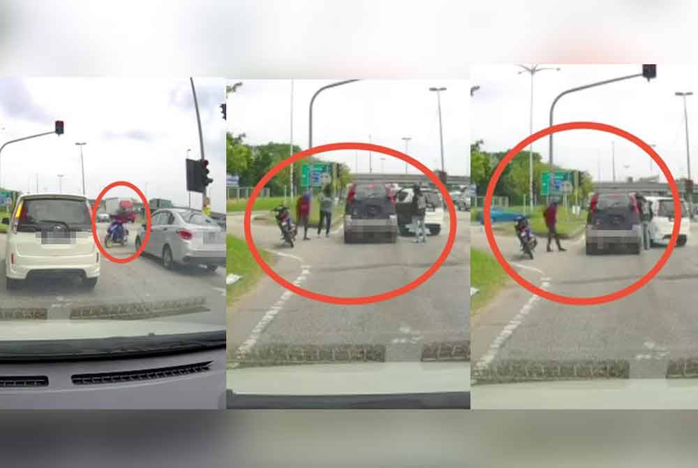 Tangkap layar rakaman video tular memaparkan tindakan sekumpulan suspek menyamun mangsa di persimpangan lampu isyarat di Seksyen 33, Shah Alam pada Isnin.