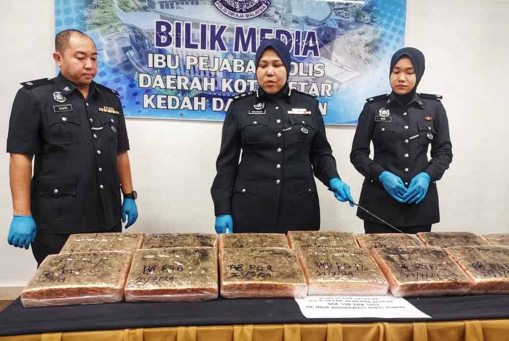 Siti Nor Salawati memberi penerangan tentang rampasan ganja yang berjaya dibuat Bahagian Siasatan Jenayah Narkotik Ibu Pejabat Polis Daerah Kota Setar.