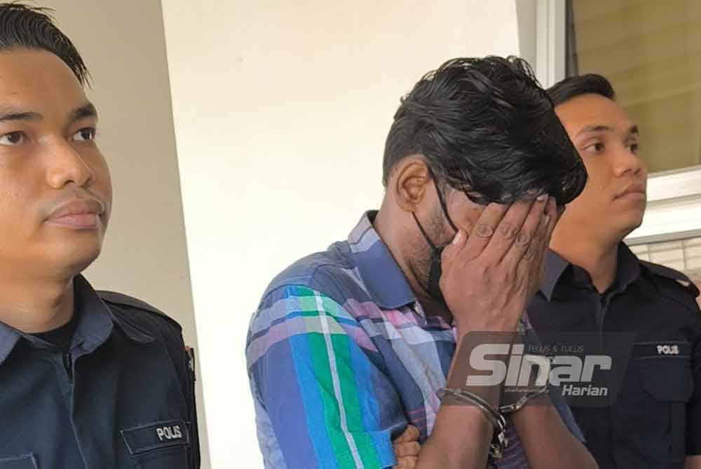 Thinesh (tengah) dibawa ke Mahkamah Majistret Petaling Jaya pada Rabu, atas satu pertuduhan menggunakan kekerasan terhadap kanak-kanak autisme berusia enam tahun, minggu lalu.