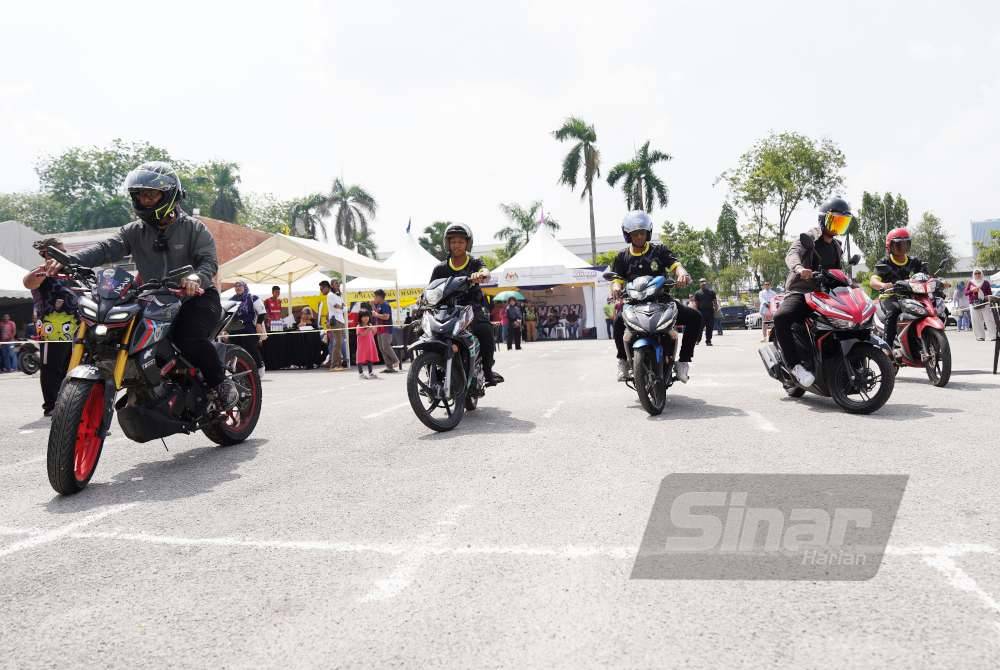 Pusingan awal Pertandingan Motor Siput sesi kedua. Foto Sinar Harian ROSLI TALIB