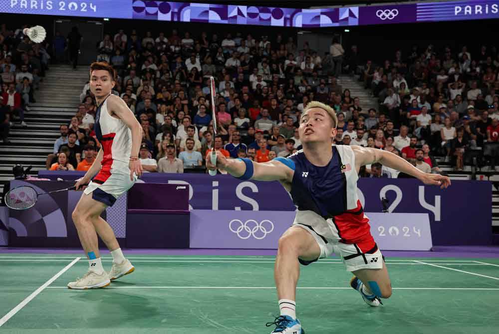 Aaron (kanan) dan Wooi Yik menjadi harapan negara untuk meraih emas Sukan Olimpik 2024. Foto Bernama.