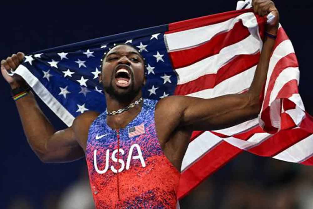 Lyles berpeluang membawa pulang dua lagi pingat emas apabila turun beraksi dalam acara 200m dan 4x100m. - Foto Reuters