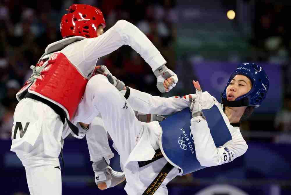 Panipak lebih dikenali sebagai 'Tenis' berjaya mempertahankan pingat emas dalam acara taekwondo kategori 49kg wanita.