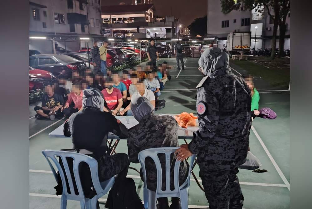 Seramai 38 PATI ditahan dalam operasi di pangsapuri di Segambut, Kuala Lumpur pada Jumaat.