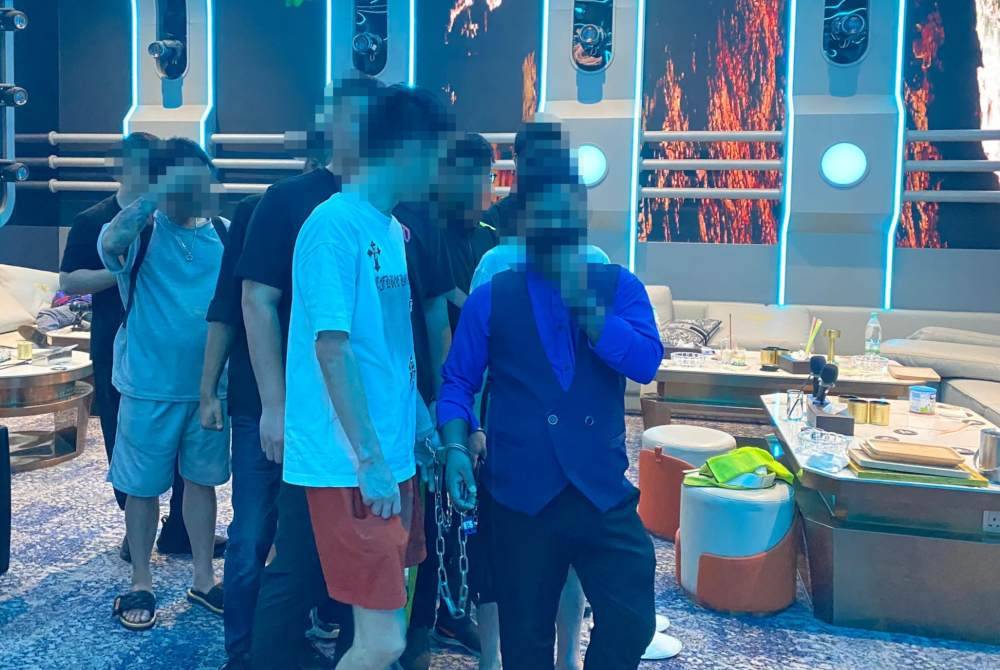 Antara individu yang ditahan JIM dalam serbuan sebuah pusat hiburan di Jalan Sultan Ismail, pada Jumaat.