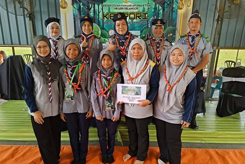 Guru dan ahli pengakap dari Sekolah Kebangsaan (SK) Bukit Belimbing pada Kempori Pengakap Negeri Selangor 2024.