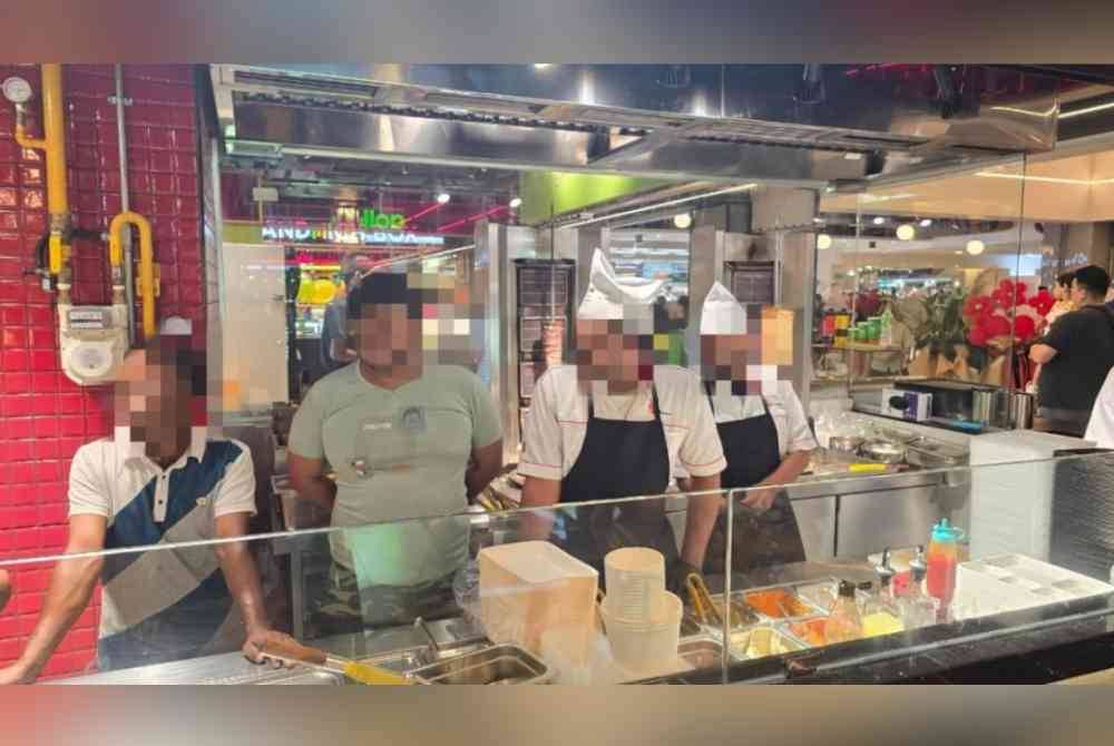 JIM Pulau Pinang menahan 11 pekerja asing dalam Ops Selera di medan selera sebuah pusat beli-belah di Seberang Jaya. Foto JIM Pulau Pinang