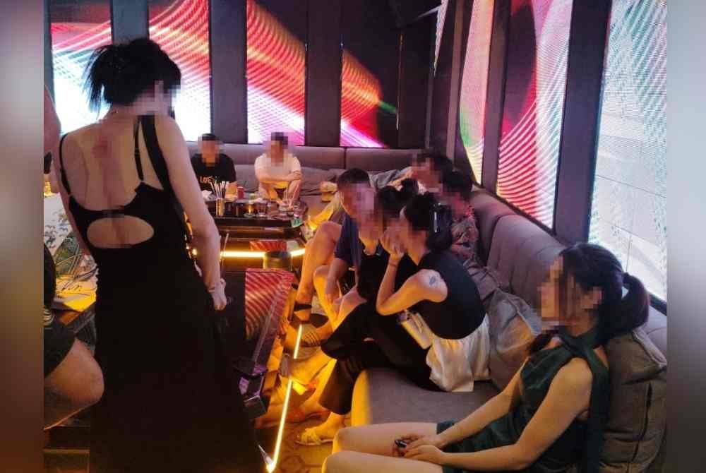 Antara wanita warga asing yang ditahan JIM dalam serbuan di premis hiburan di sebuah bangunan pejabat di ibu negara, pada Khamis.