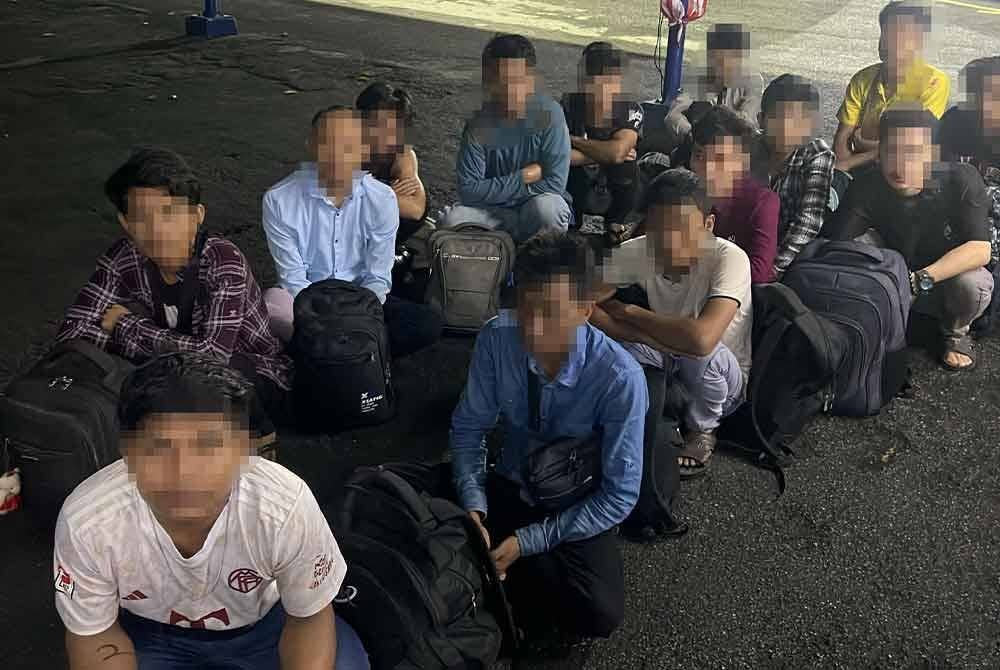 Antara warga Myanmar yang ditahan menerusi Op Pintas, pada Khamis.