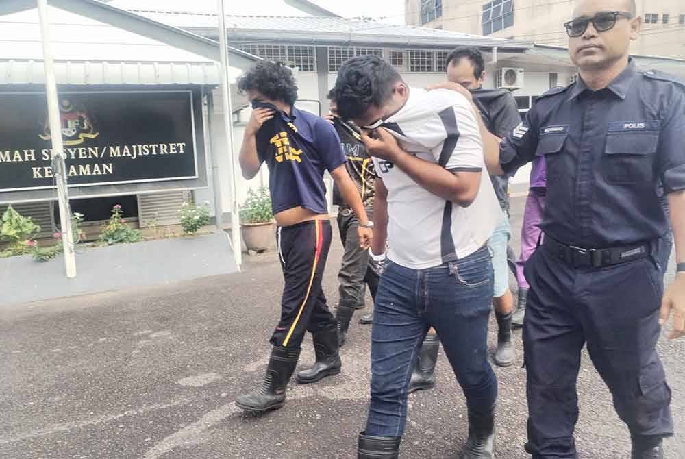 Muhammad Faris Zaharuddin (depan,tengah) didakwa atas pertuduhan mencabul seorang penumpang wanita, Jumaat lepas.