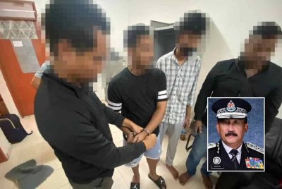 JIM menahan empat lelaki Bangladesh dalam serbuan kedua di sebuah kediaman di Petaling Jaya, pada Rabu. (Gambar kecil: Ruslin)