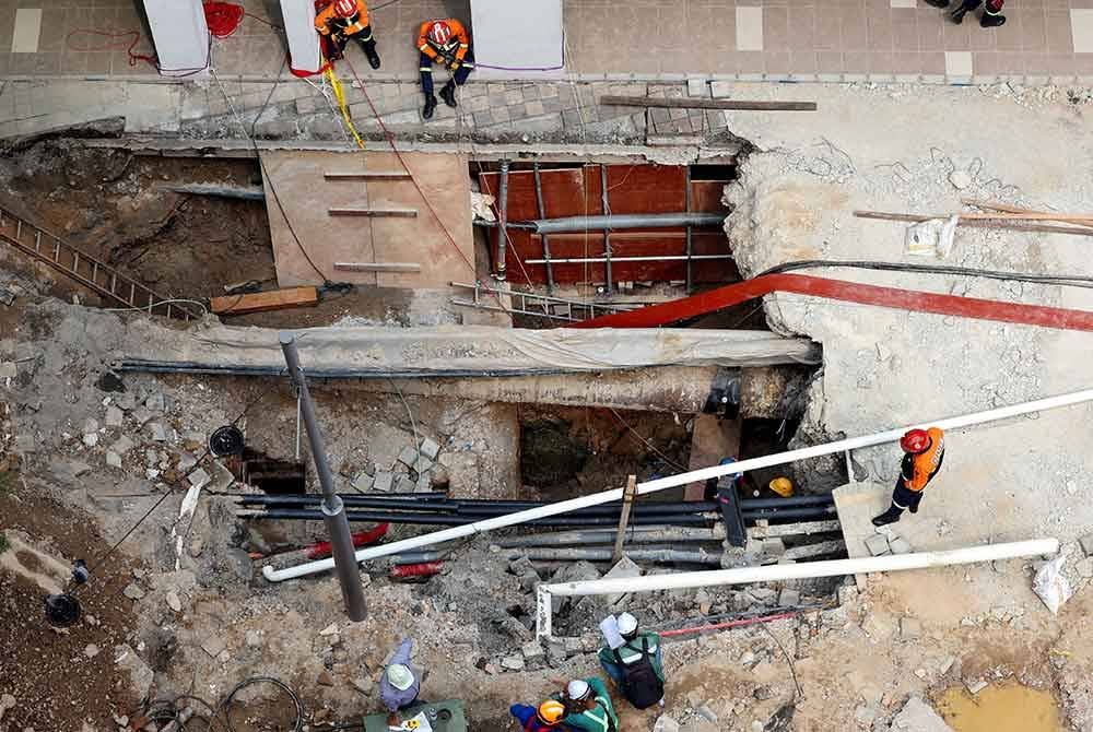 Keadaan di tanah jerlus yang membabitkan seorang mangsa wanita warganegara India. Foto Bernama