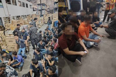 JIM menggempur dua gudang barang e-dagang di Jalan Kebun, Shah Alam pada Isnin.