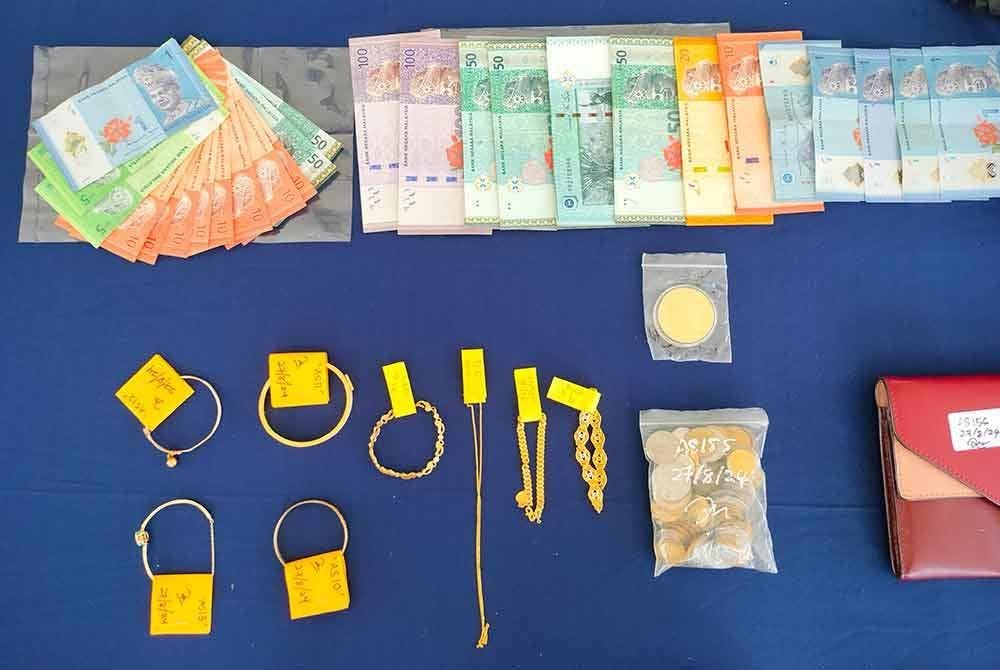 Wang tunai berjumlah RM1,811 yang dirampas dalam serbuan membabitkan Geng Ah Boon.