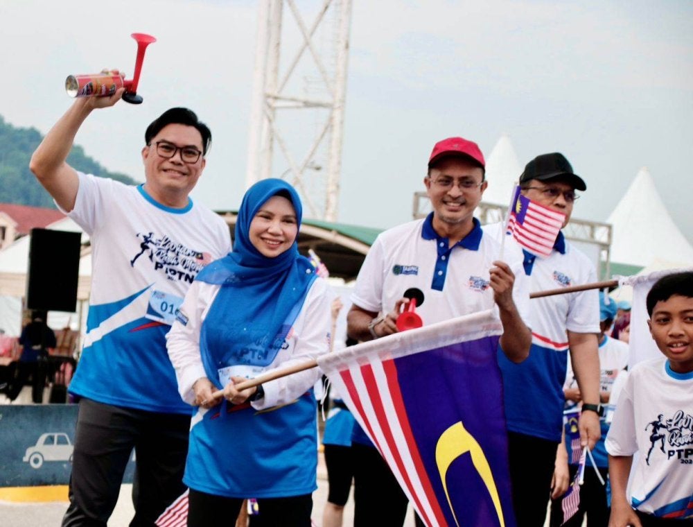 Norliza ketika sesi pelepasan Larian Kasih Merdeka PTPTN 2024 di Bayan Baru, sempena sambutan Hari Kebangsaan.
