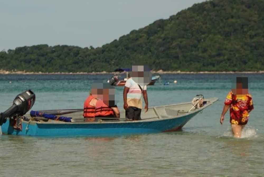 Sebahagian warga asing yang ditahan JIM menerusi satu operasi khas di Pulau Perhentian, Terengganu pada Isnin.
Foto: JIM.
