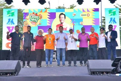Mohd Najwan (tengah) ketika majlis pelancaran RASA Layan Curry Fiesta 2024 X HAVOC Festival pada Sabtu lalu.