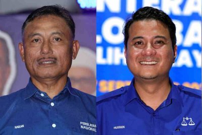 Mohamad Haizan (kiri) merupakan calon PN manakala Syed Hussien calon BN bagi PRK DUN Mahkota. Foto Bernama