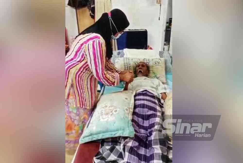 Siti Sharipah Alauyah setia di sisi suaminya yang terlantar akibat jangkitan kuman.