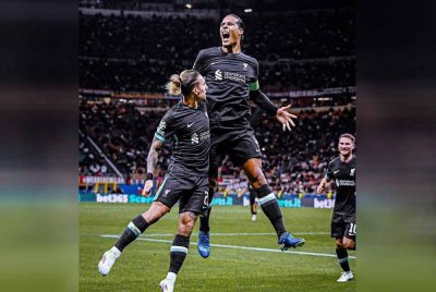 Van Dijk antara pencetak gol Liverpool di Milan. Foto Agensi