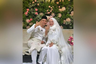 Amira Aisya selamat diijabkabulkan dengan Luqman Long, pada Jumaat. Foto Facebook Muda