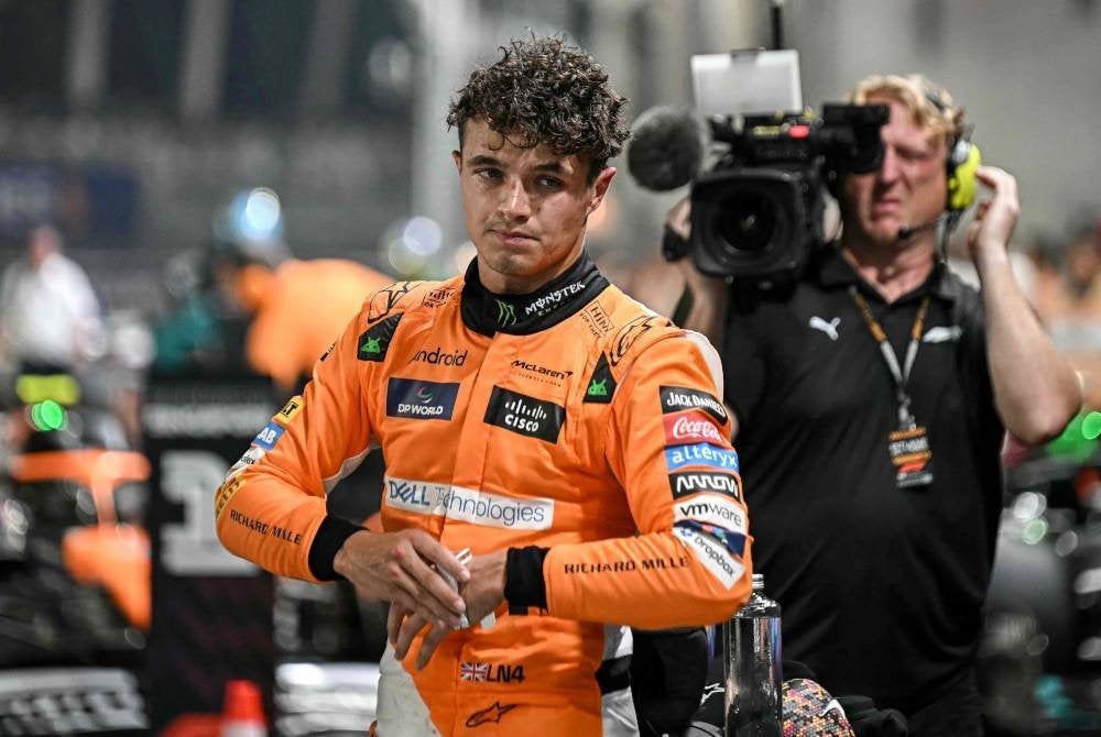 Lando Norris meraih petak pertama dalam sesi kelayakan menjelang perlumbaan Grand Prix Formula Satu Singapura di Litar Marina Bay di Singapura. Foto AFP