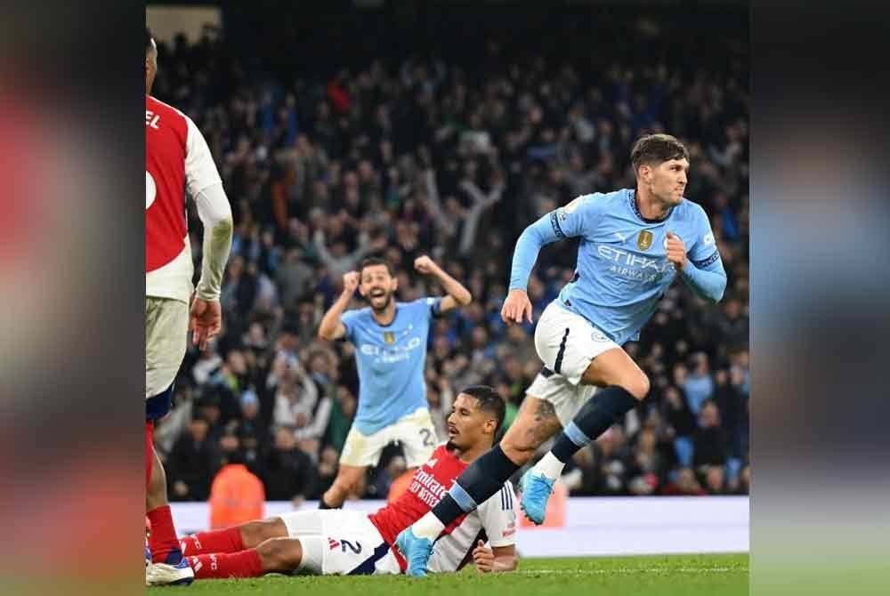 Stones antara penyumbang gol buat Manchester City. - Foto: Agensi