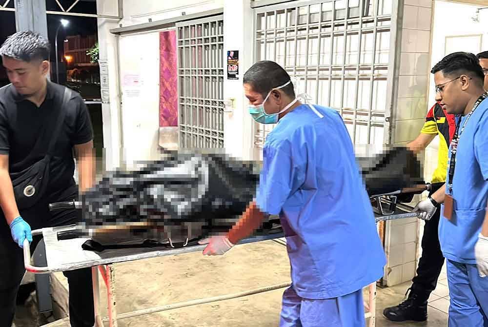 Mayat suspek dibawa ke Hospital Tuanku Ampuan Najihah di Kuala Pilah sebelum dibawa ke HTJ