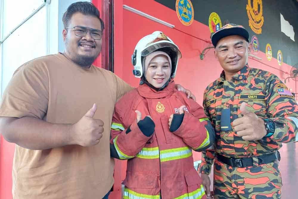 Mohd Khairul Izhan (kanan) dan Syed Amirul bersama Wawa.