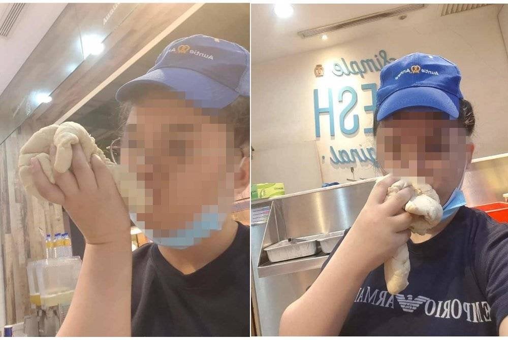 Gambar pekerja Auntie Anne's Mid Valley Megamall mencium doh roti tular di media sosial.