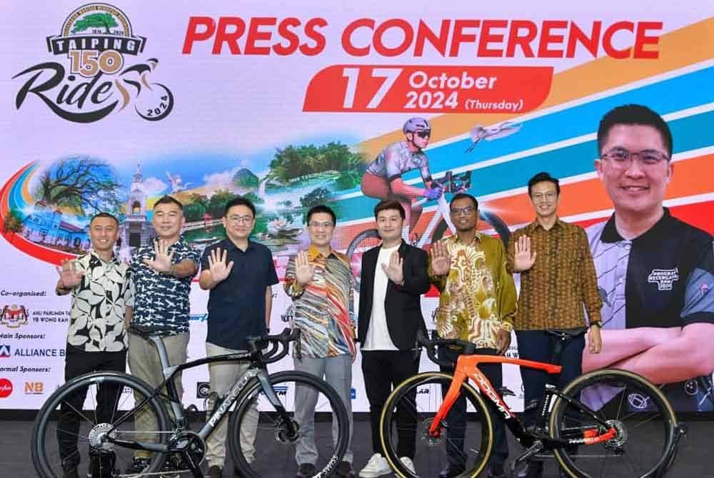 Kah Woh selepas sidang media dan sesi memperkenalkan penaja Taiping 150 Ride 2024 yang dijadualkan berlangsung pada 8 Disember depan.