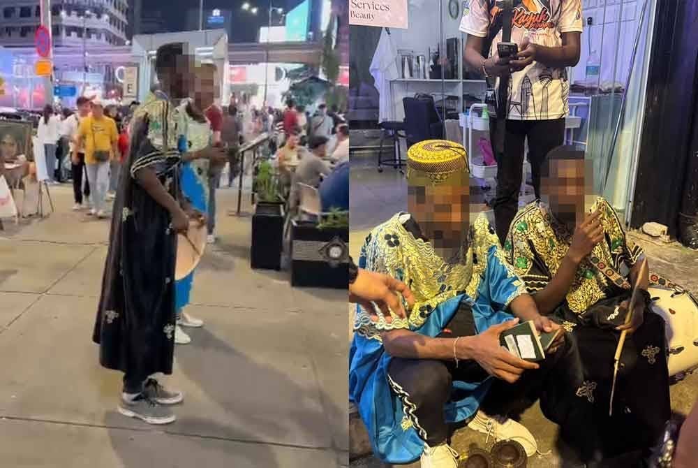 Aksi dua lelaki bermain alat muzik bagi meminta sedekah dikesan sebelum ditahan JIM Kuala Lumpur, di Bukit Bintang pada Sabtu.