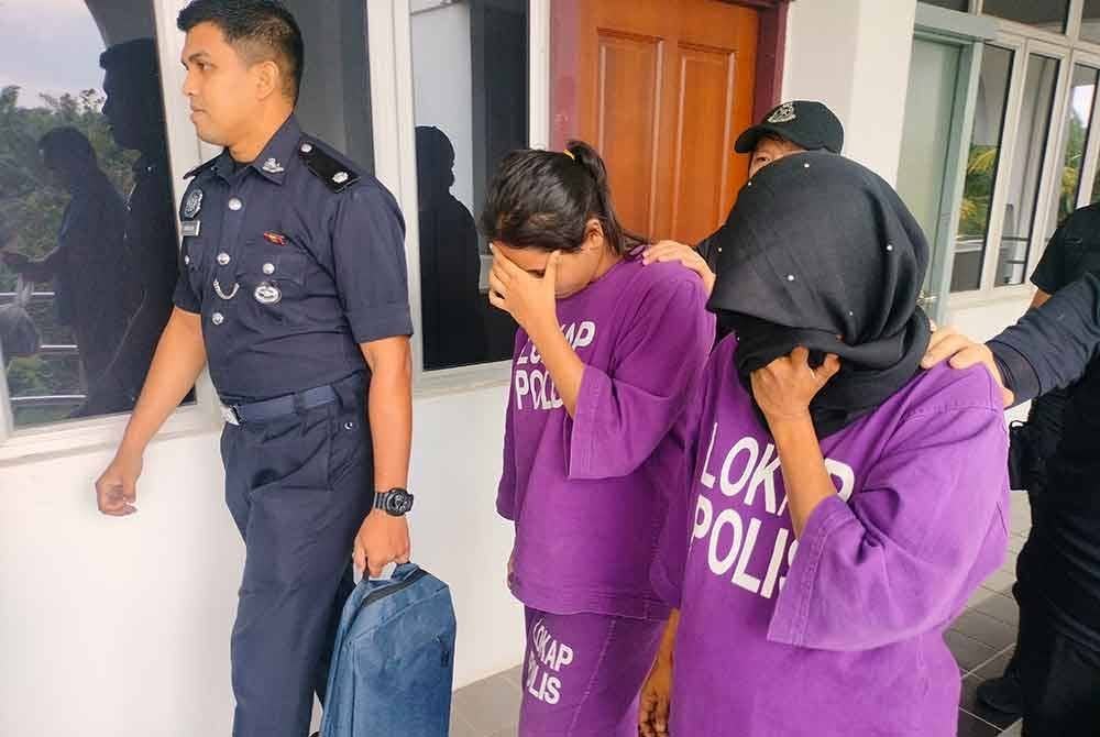 Norjahan dibawa keluar selepas didakwa di Mahkamah Majistret Kota Tinggi pada Khamis.