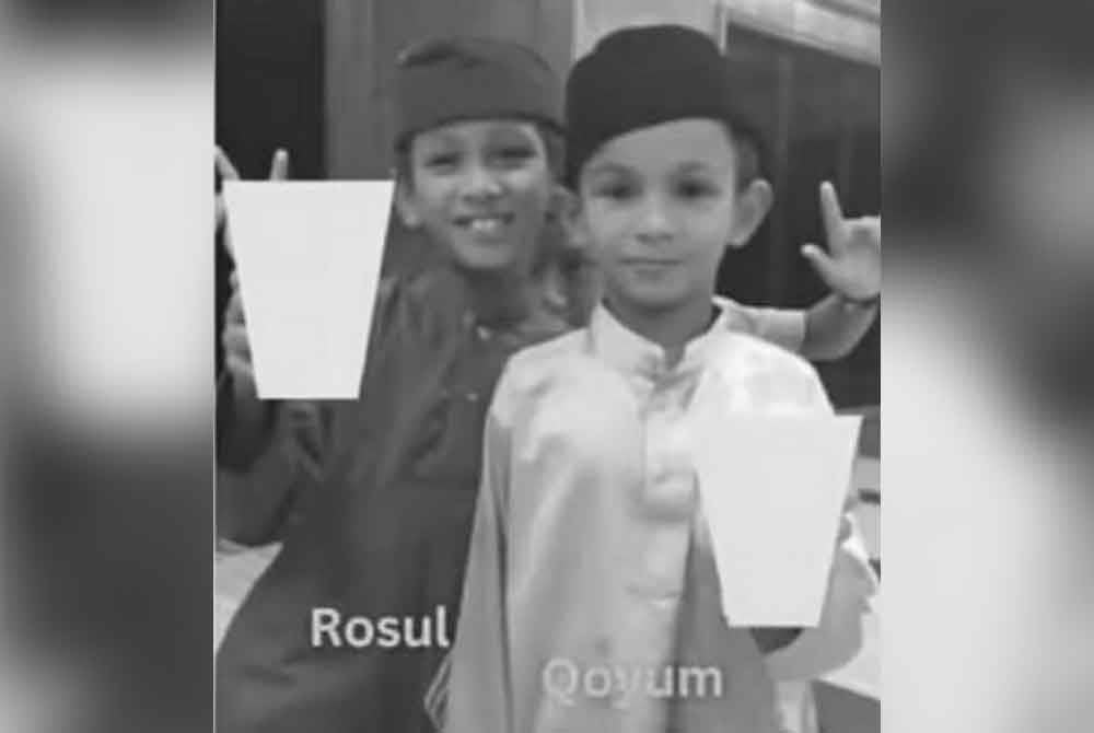 Rasul (kiri) dan Qoyum yang meninggal dunia akibat lemas dalam parit di Jalan Jepun, Kampung Melaka, Tanjong Karang di sini pada petang Jumaat.