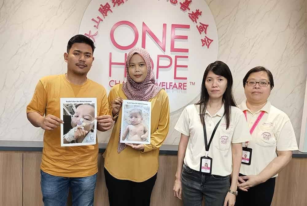 Mohamad Iskandar (kiri) dan Nazirah tampil ke pejabat One Hope Charity & Welfare bagi memohon bantuan untuk mengumpulkan dana pembedahan anak mereka.